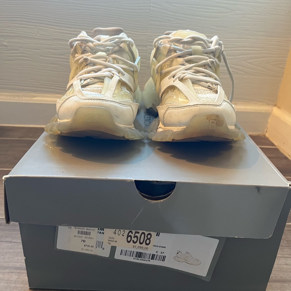 Low-top layered mesh, faux-leather, and rubber sneakers in off-white.

Size 37